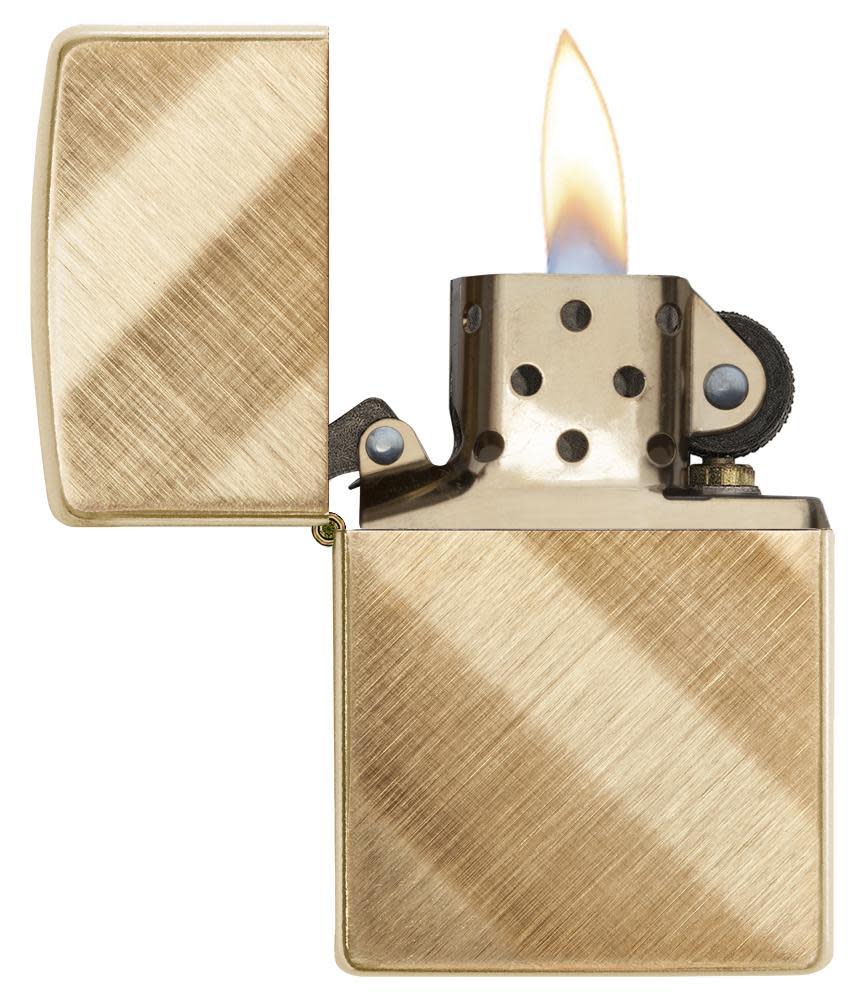 Front view of Diagonal Weave Brass Lighter open and lit